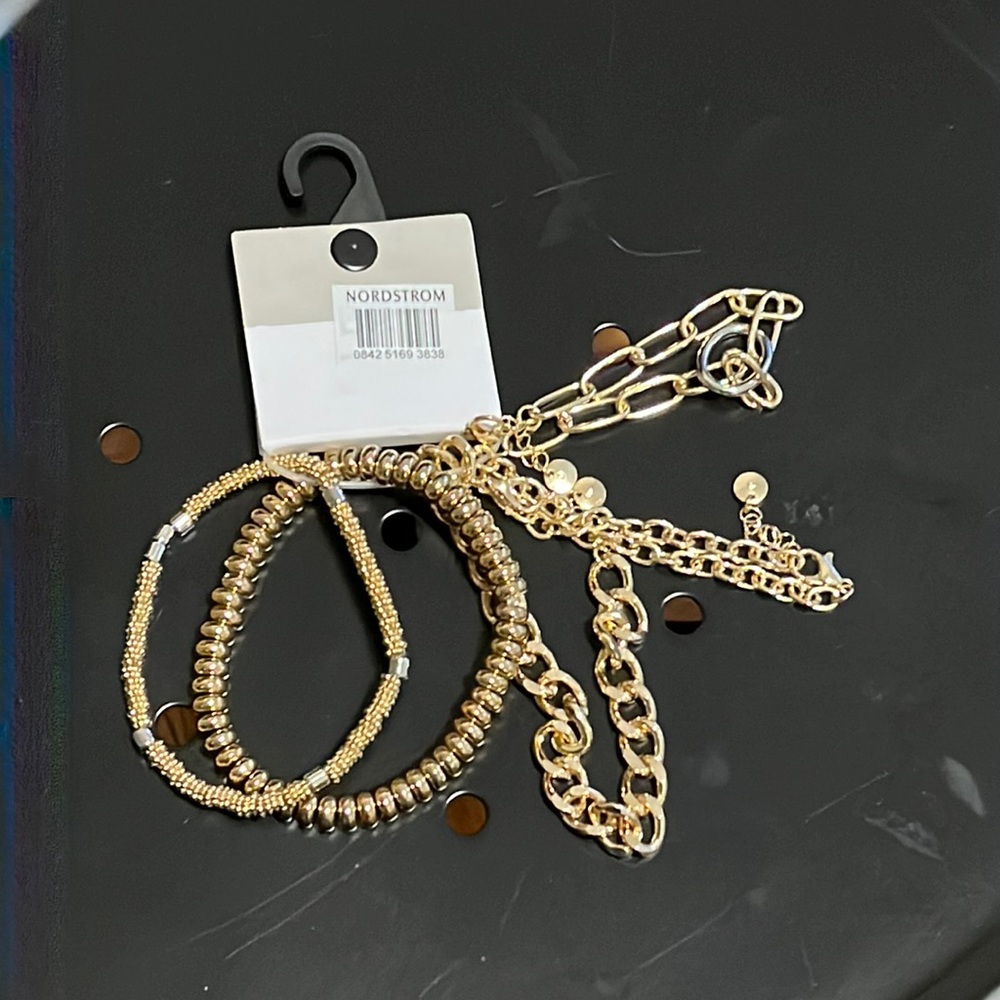 Fashion jewelry. 5 separate gold tone bracelets.